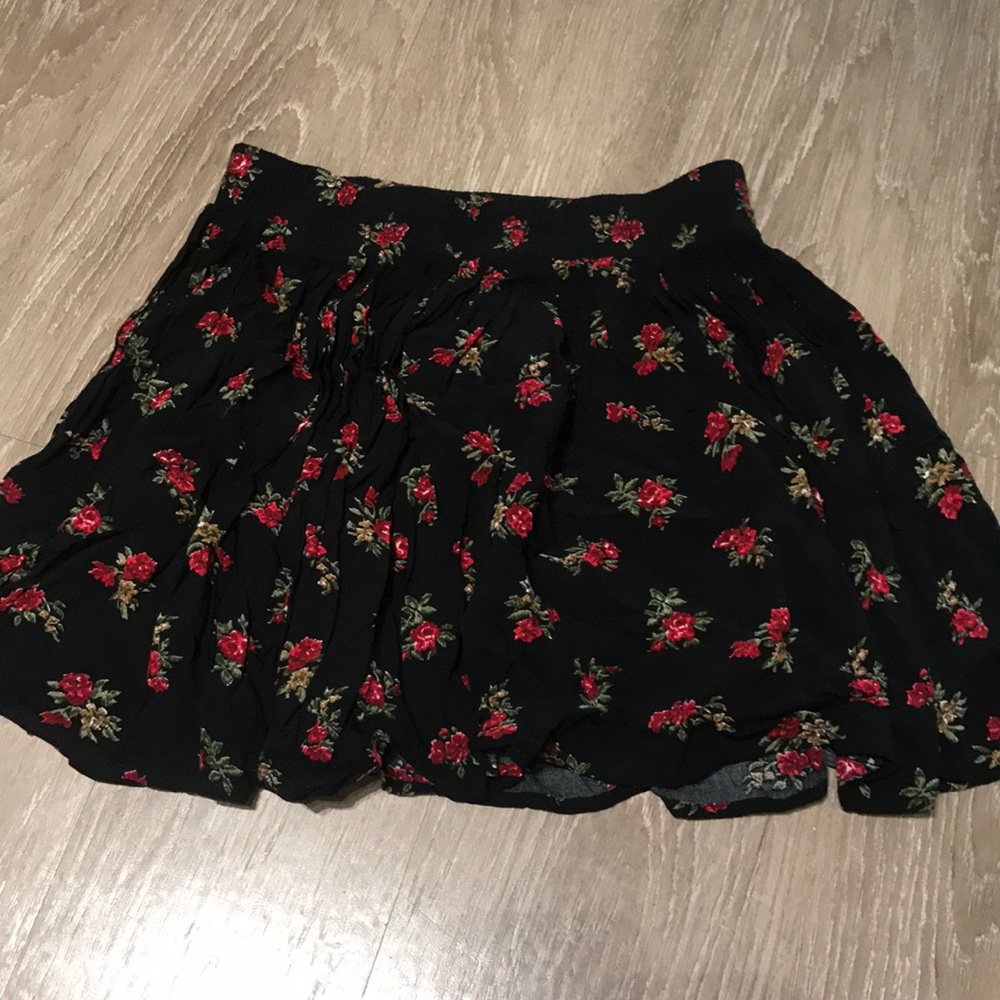 Brandy Melville black floral skirt.